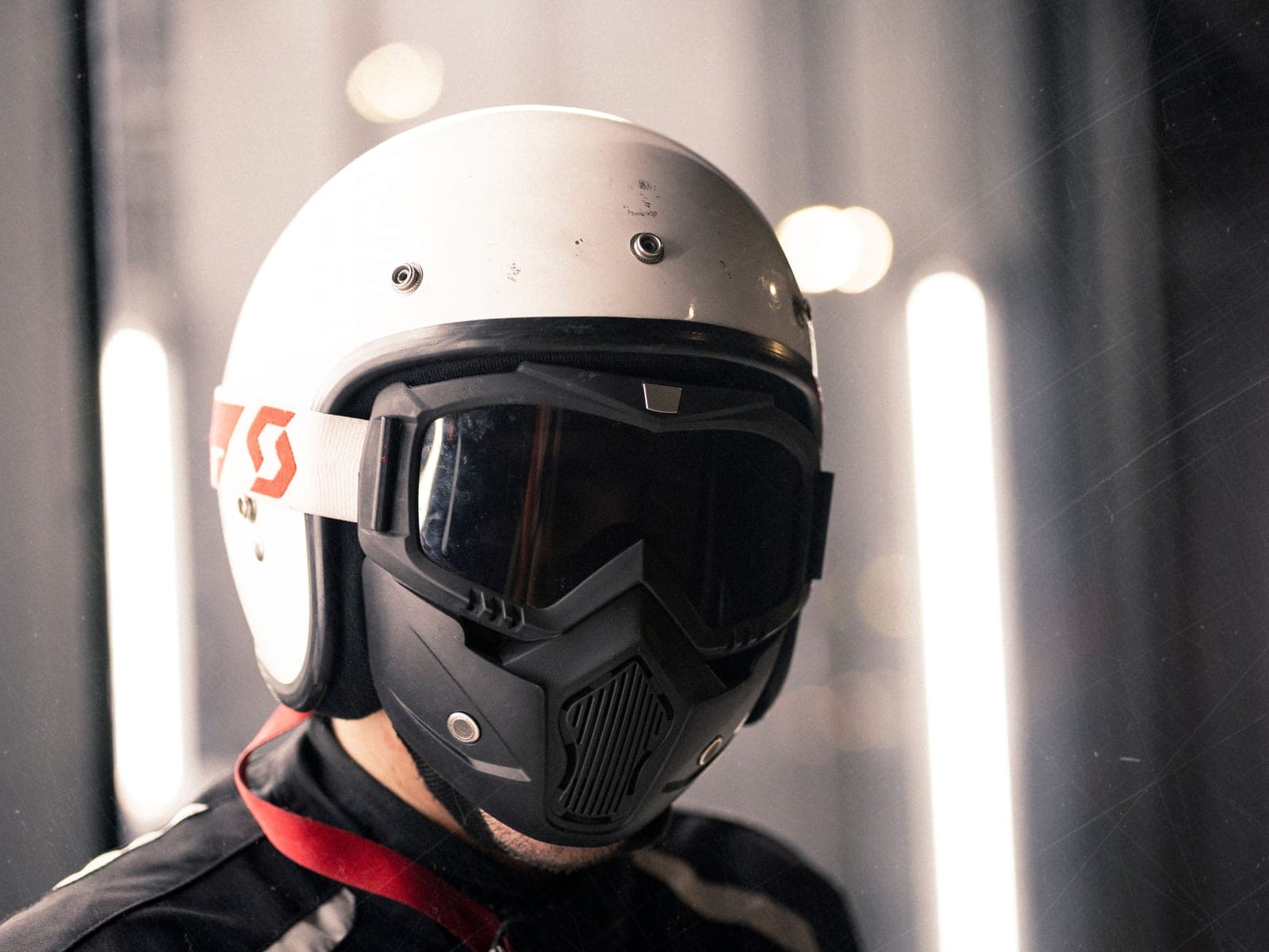 A Bluetooth intercom unit mounted on a helmet
