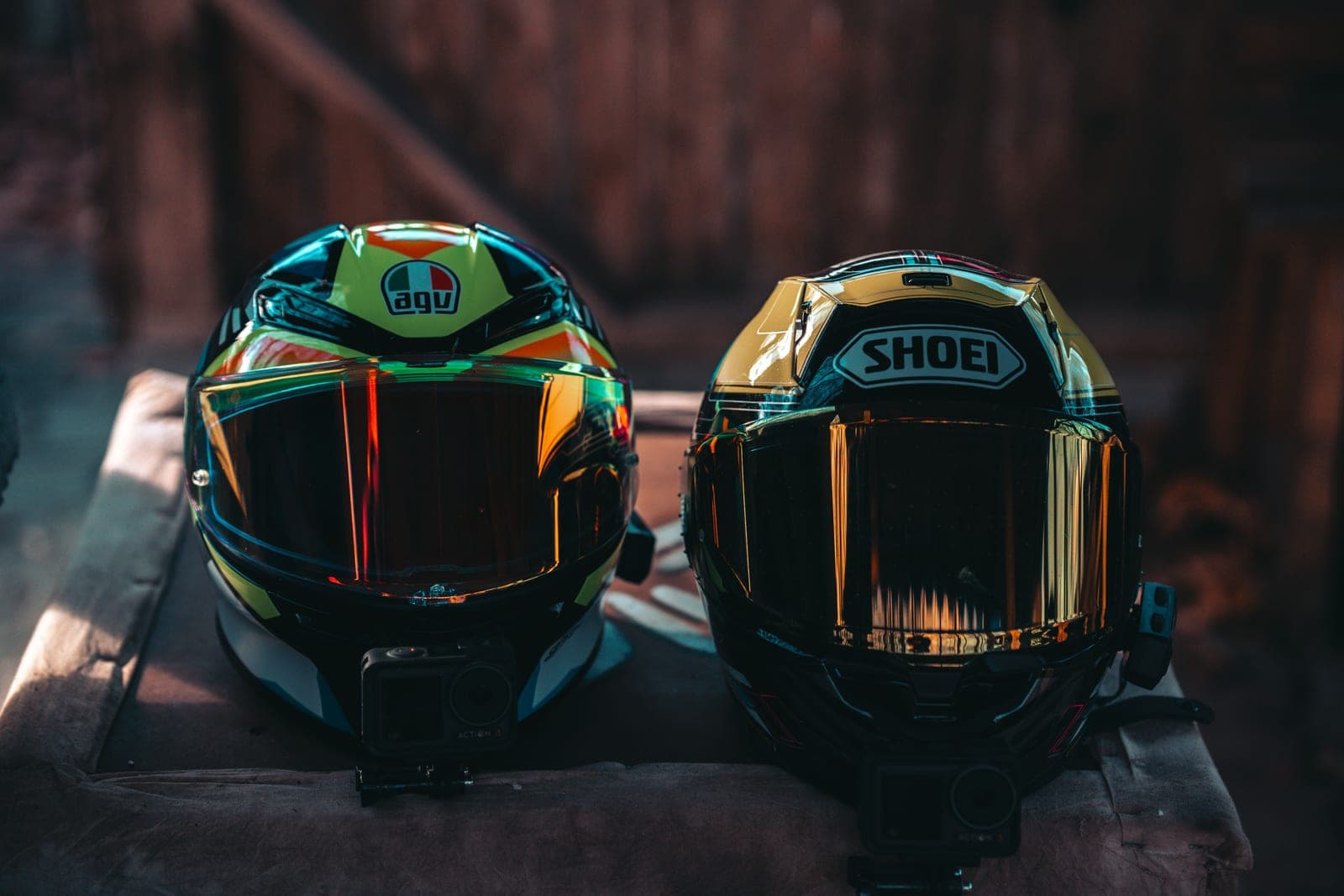 A tape measure beside a motorcycle helmet